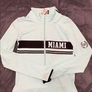 Mint green quarter zip sweater from pink